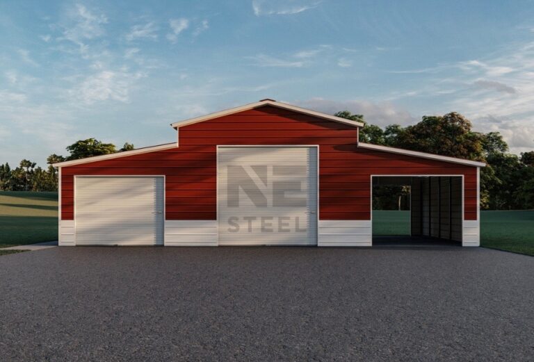 Red agricultural barn with white trim and an open lean-to extension on the side.